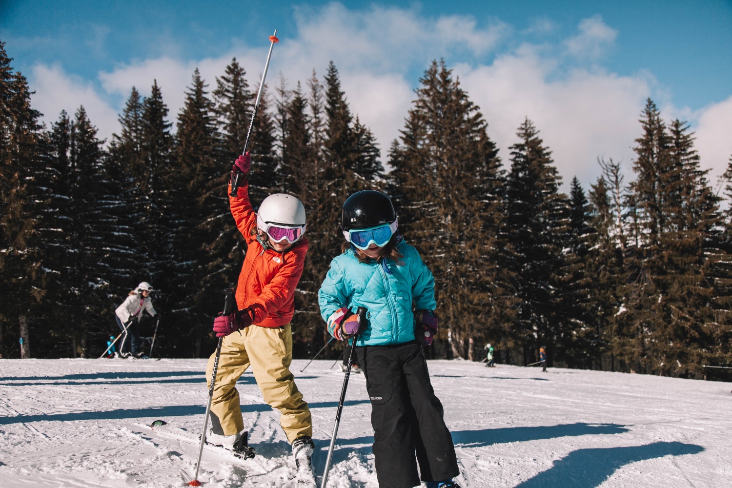 Child skiers playing in snow