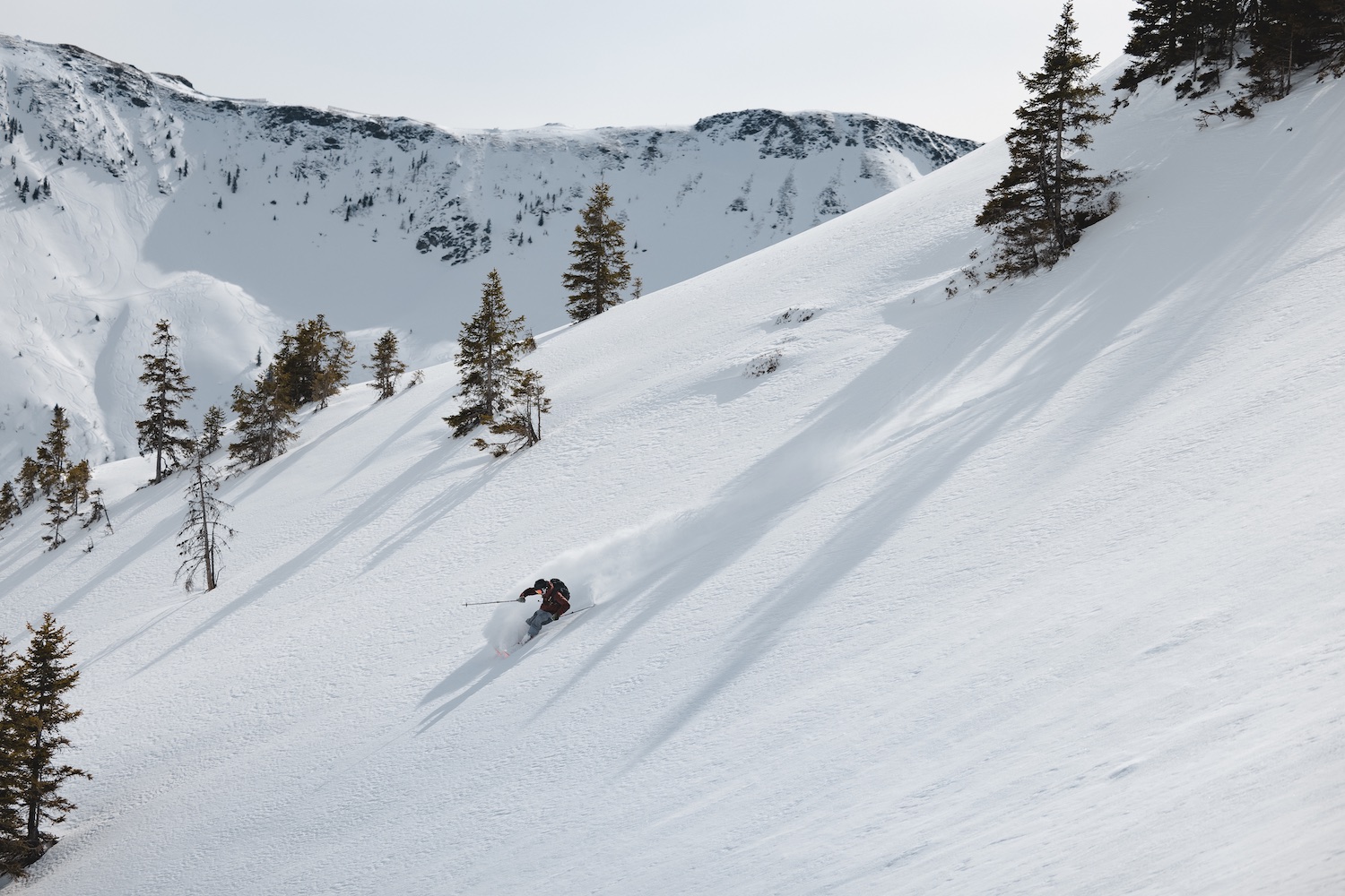 Man freeriding down fresh ski slope, Skicircus Saalbach Hinterglemm Leogang Fieberbrunn